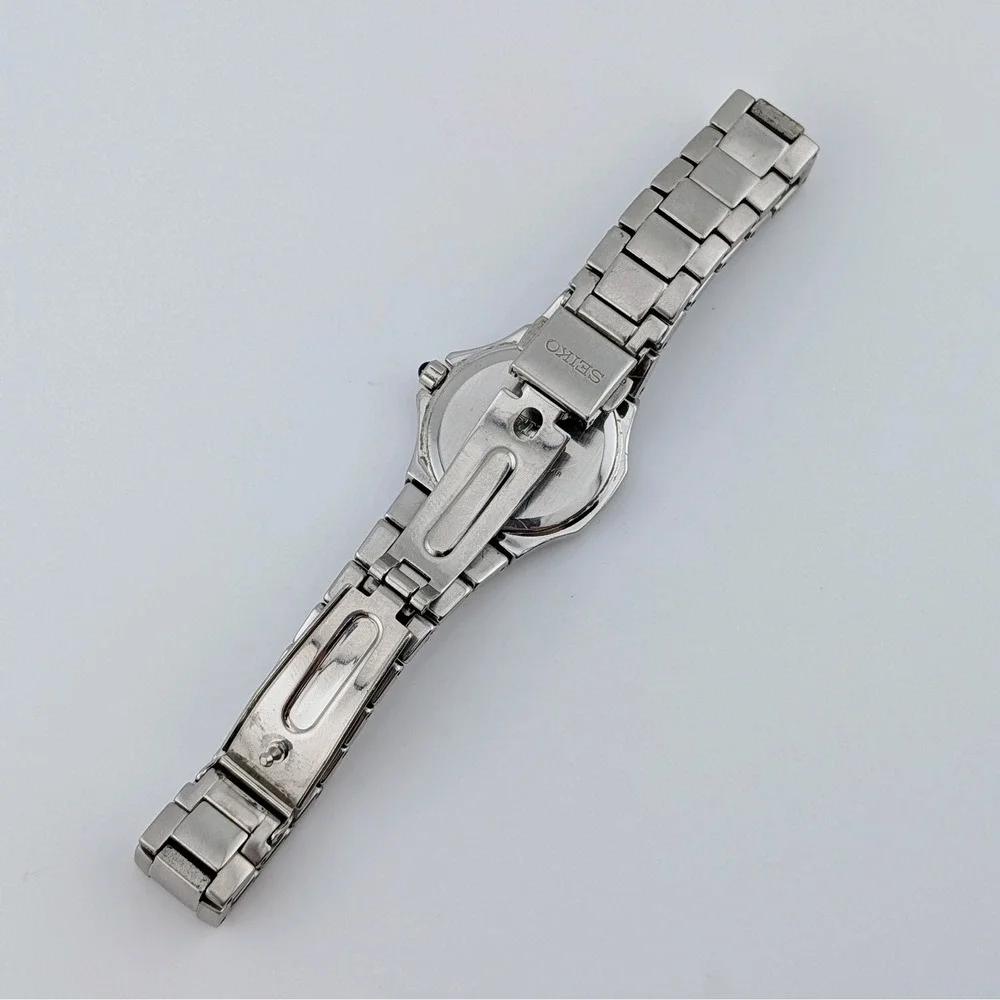 Seiko Coutura 7N82-0BF0 Diamond Bezel MOP Sapphire Women's Watch 28mm 7